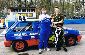 Chris presented with the winners trophy